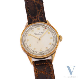 Movado Tempomatic quadrante Breguet con cappuccio d'oro, movimento automatico Movado 220, anni '50