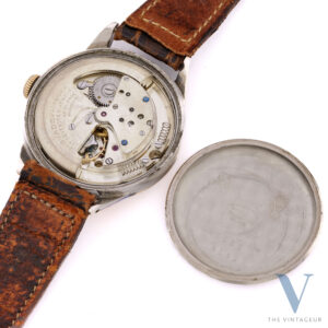 Movado Tempomatic quadrante Breguet con cappuccio d'oro, movimento automatico Movado 220, anni '50