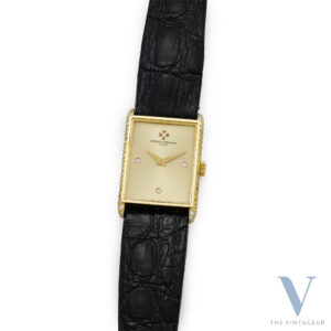 VACHERON CONSTANTIN "DIAMOND SHOULDERED" RECTANGULAR CASE IN SOLID 18KT YELLOW GOLD WITH DIAMONDS, MANUALLY WINDING VC 1032 MOVEMENT, FROM 1985