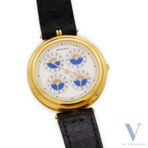 GERALD GENTA FOUR TIME ZONES REF. G 3122.4, OVERSIZED 18K YELLOW GOLD CASE, JLC 605 QUARTZ CRYSTAL MOVEMENT, FULL SET, NOS, FROM THE 1990s.