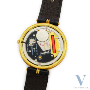 GERALD GENTA FOUR TIME ZONES REF. G 3122.4, OVERSIZED 18K YELLOW GOLD CASE, JLC 605 QUARTZ CRYSTAL MOVEMENT, FULL SET, NOS, FROM THE 1990s.