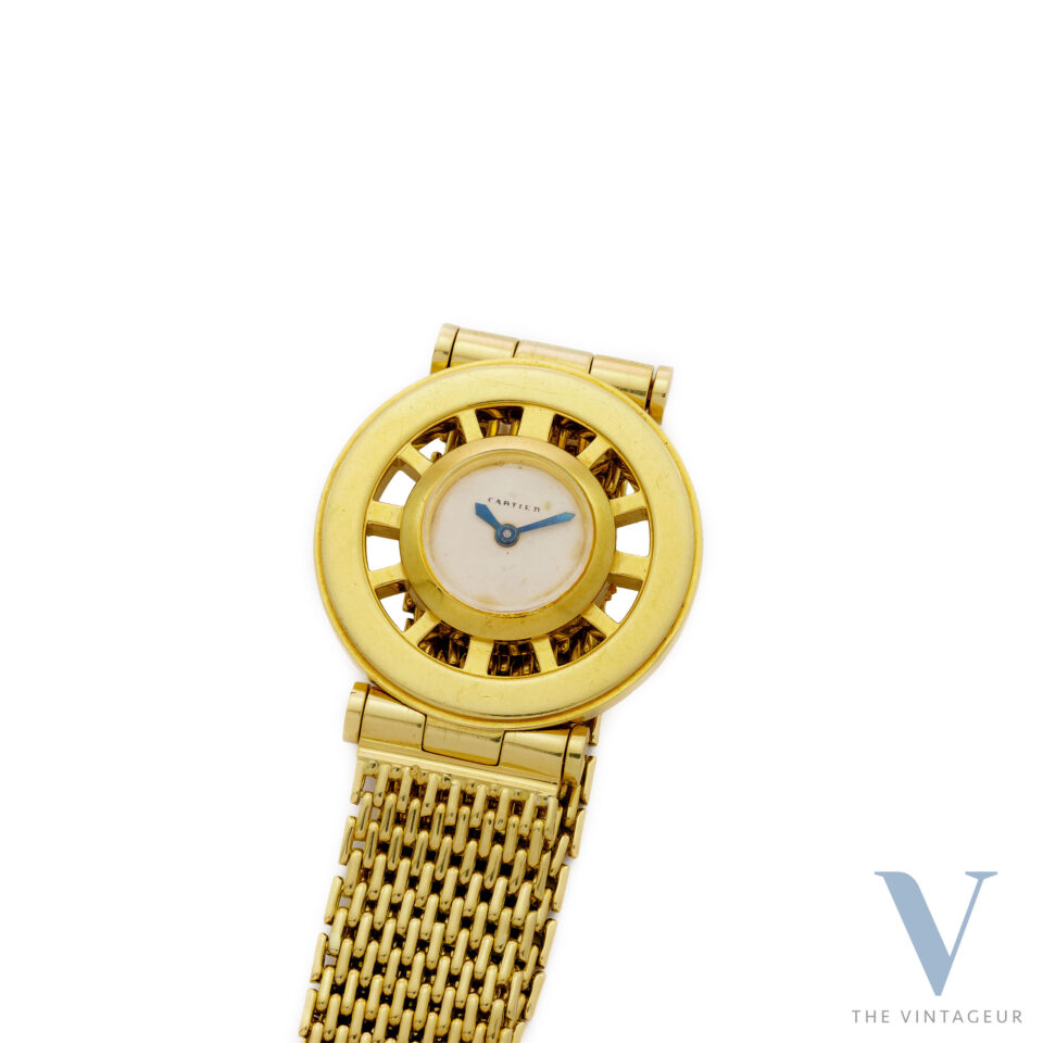 CARTIER "GOUVERNAIL", SKELETON 18KT YELLOW GOLD CASE, 18KT YELLOW GOLD BRACELET WITH 18KT ROSE GOLD "EJ" DEPLOYANT CLASP, HAND-WOUND MOVEMENT EWC. CO 462/2, FROM THE 1940s