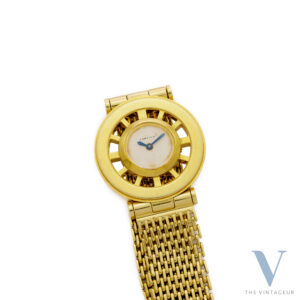CARTIER "GOUVERNAIL", SKELETON 18KT YELLOW GOLD CASE, 18KT YELLOW GOLD BRACELET WITH 18KT ROSE GOLD "EJ" DEPLOYANT CLASP, HAND-WOUND MOVEMENT EWC. CO 462/2, FROM THE 1940s