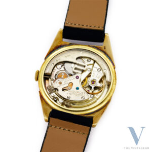 MOVADO "FUTURAMIC" REF. 48468, RADIAL DIAL, 14KT YELLOW GOLD CASE BY FAVRE & PERRET, IN-HOUSE AUTOMATIC MOVEMENT N. 115, FROM THE 1950s
