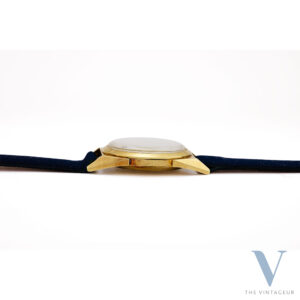 MOVADO "FUTURAMIC" REF. 48468, RADIAL DIAL, 14KT YELLOW GOLD CASE BY FAVRE & PERRET, IN-HOUSE AUTOMATIC MOVEMENT N. 115, FROM THE 1950s