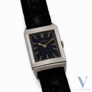 JAEGER LECOULTRE REVERSO, EMBOSSED BLACK DIAL, HAND-WOUND LISICA-TAVANNES 064 MOVEMENT, FROM THE EARLY 1930s.