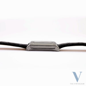 JAEGER LECOULTRE REVERSO, EMBOSSED BLACK DIAL, HAND-WOUND LISICA-TAVANNES 064 MOVEMENT, FROM THE EARLY 1930s.