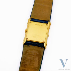 CORUM "ARC DE TRIOMPHE" REF. 24.374.65, BLUE GUILLOCHE DIAL, 18KT YELLOW GOLD CASE WITH DIAMONDS AND SAPPHIRES, ISA 125 QUARTZ MOVEMENT, FROM 1980