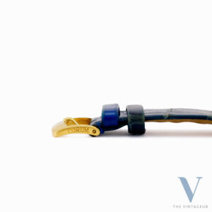 CORUM "ARC DE TRIOMPHE" REF. 24.374.65, BLUE GUILLOCHE DIAL, 18KT YELLOW GOLD CASE WITH DIAMONDS AND SAPPHIRES, ISA 125 QUARTZ MOVEMENT, FROM 1980
